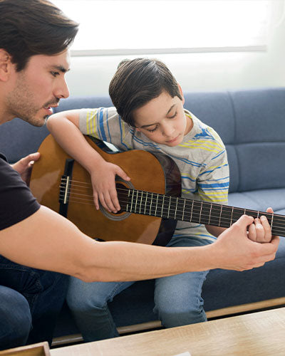 private guitar tuition near me - district tuition