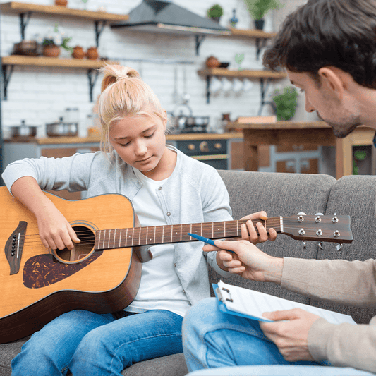 Guitar Private Tutor - District Tuition